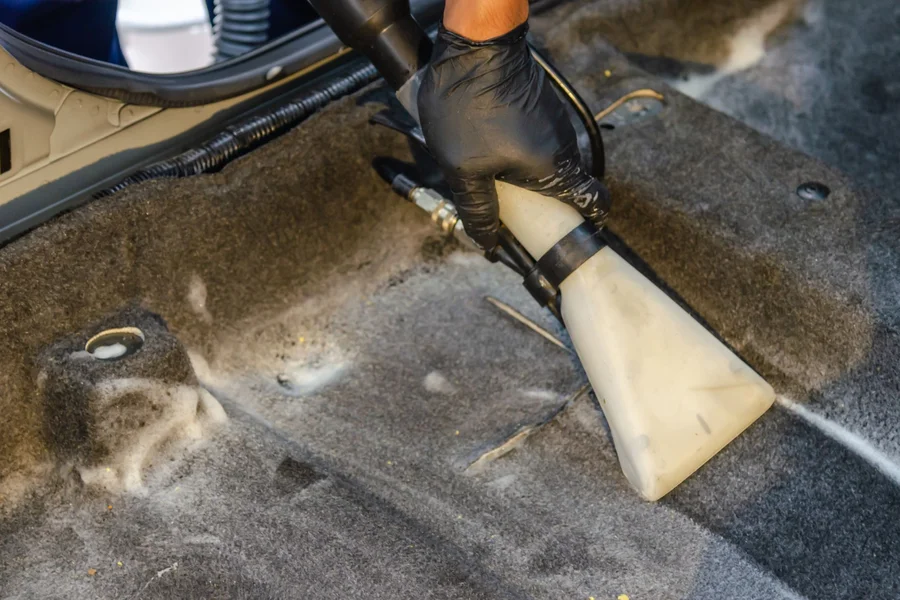 carpet car mats vacuum Vacuuming carpet car floor mats during interior detailing